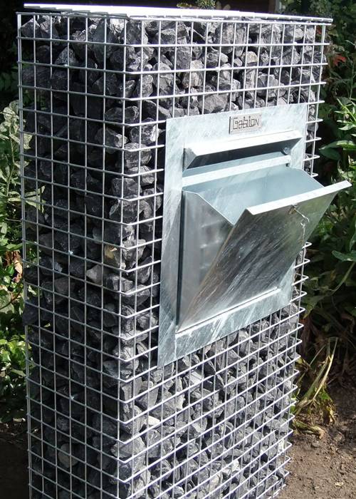 Modern garden letterbox made with gabion basket.