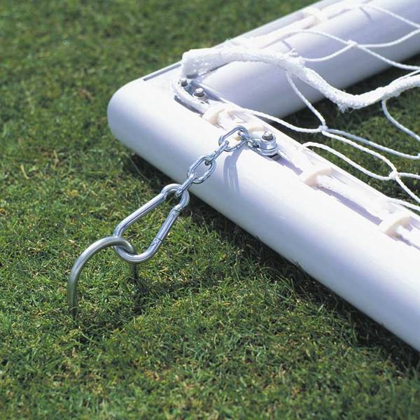The soccer goal is fixed with U shaped anchor pegs.